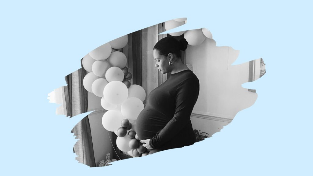 black and white pregnancy picture on a blue background